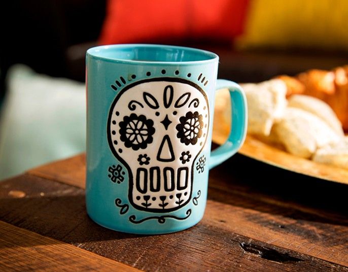 

with an etched sugar skull this blue cuppa color mug