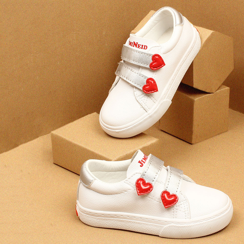 white shoes red heart