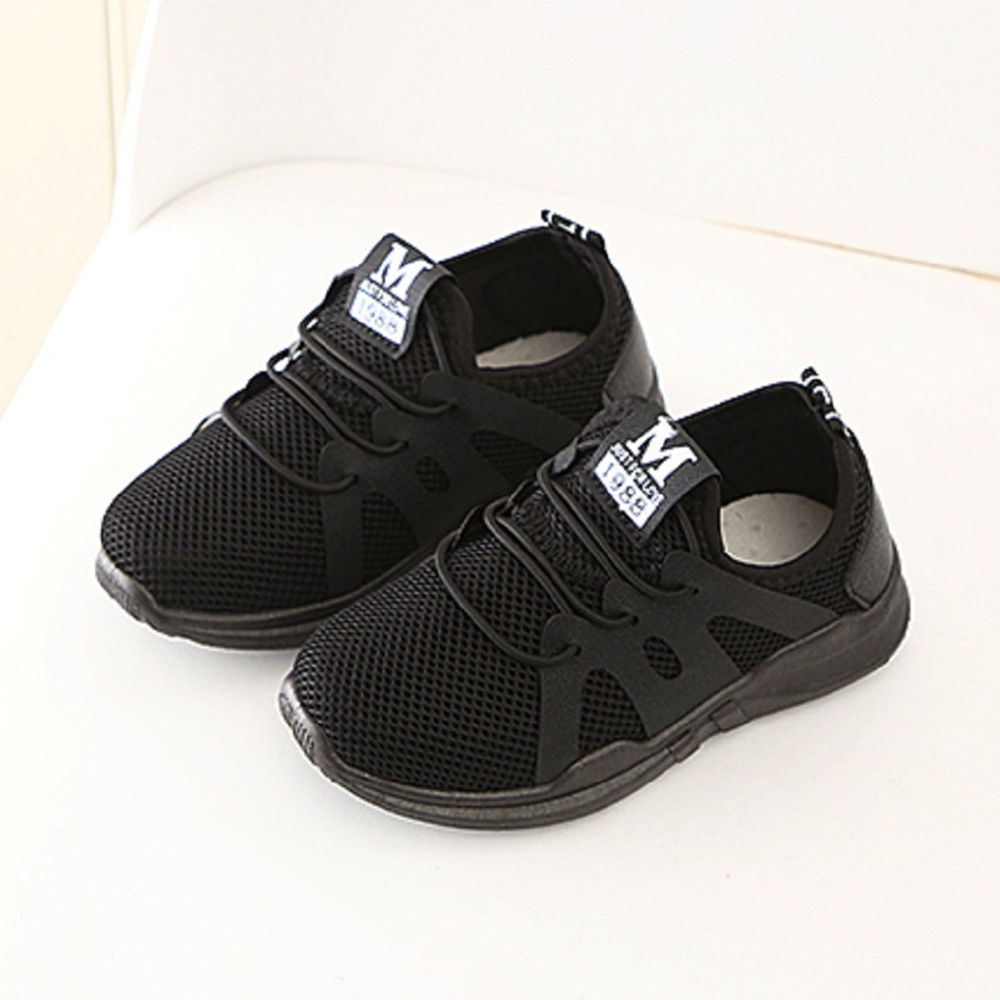 solid black athletic shoes