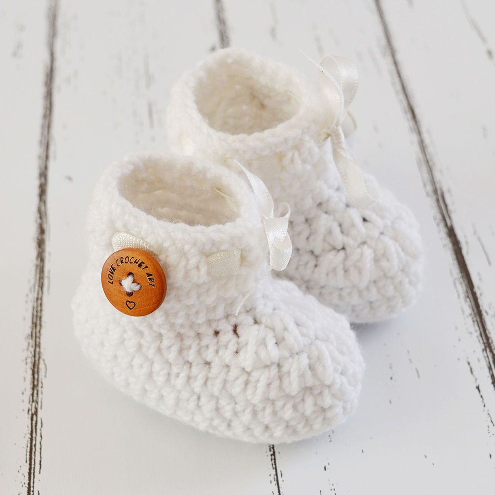 white crochet baby booties
