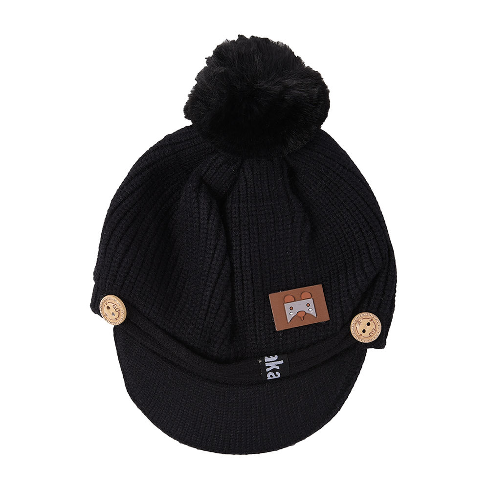 black pom pom cap