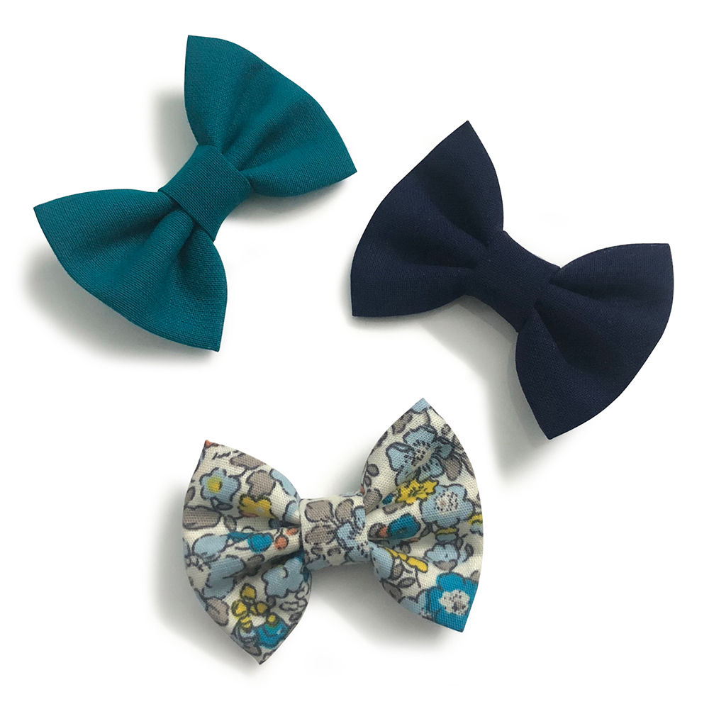 

sweet and simple handmade bows attached to an alligator clip