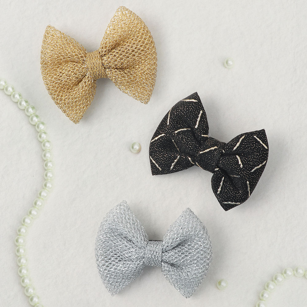 

sweet and simple handmade bows attached to an alligator clip