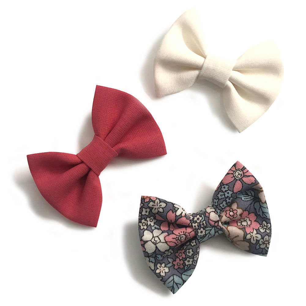 

sweet and simple handmade bows attached to an alligator clip
