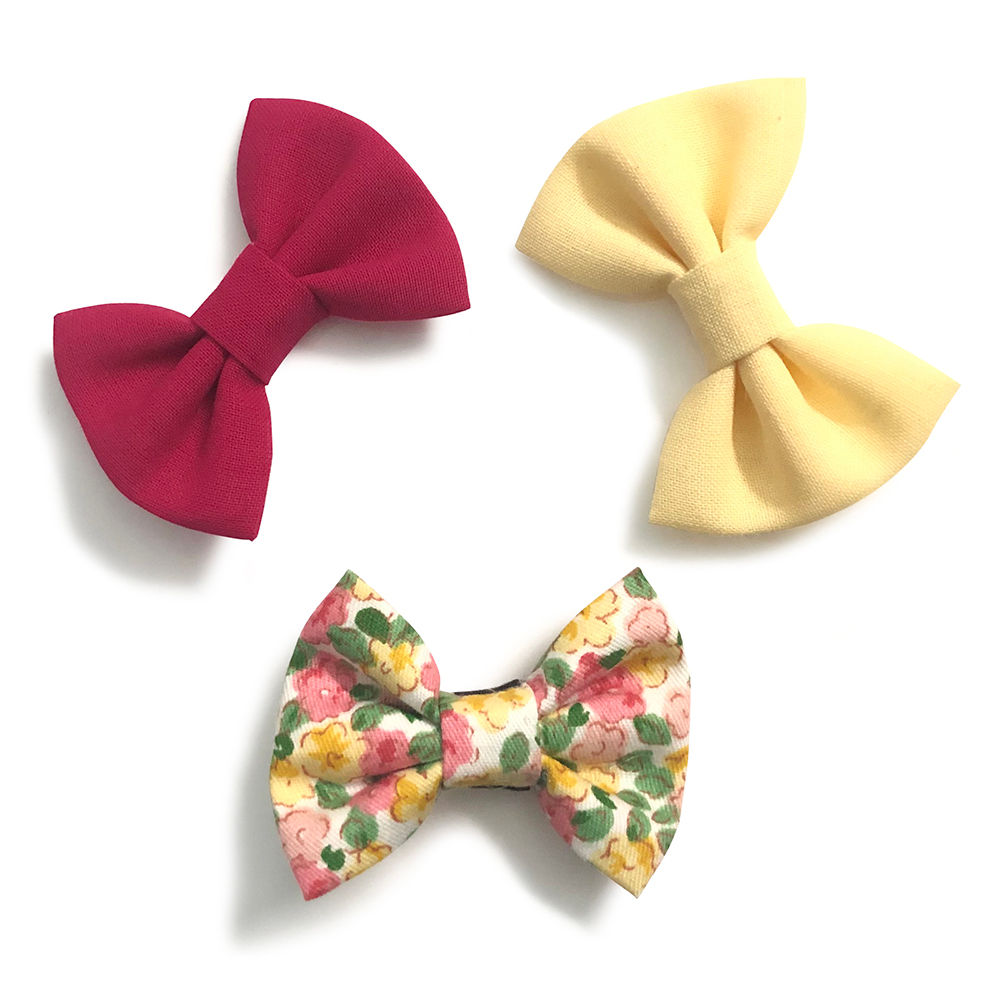 

sweet and simple handmade bows attached to an alligator clip