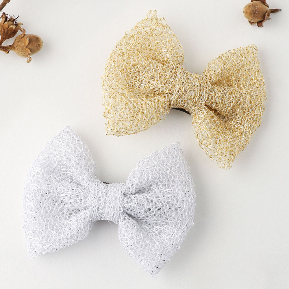 

sweet and simple handmade bows attached to an alligator clip