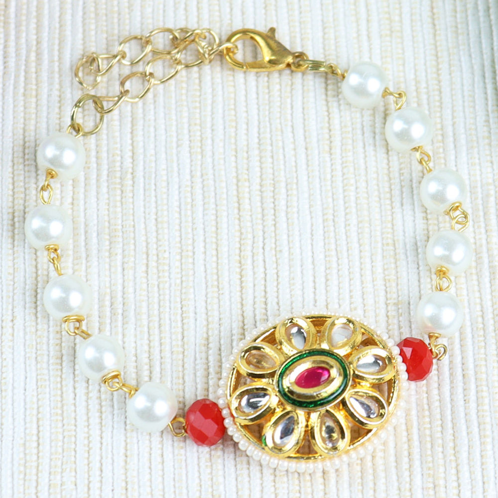 

this beaded kundan stone bracelet completes the ethnic look for