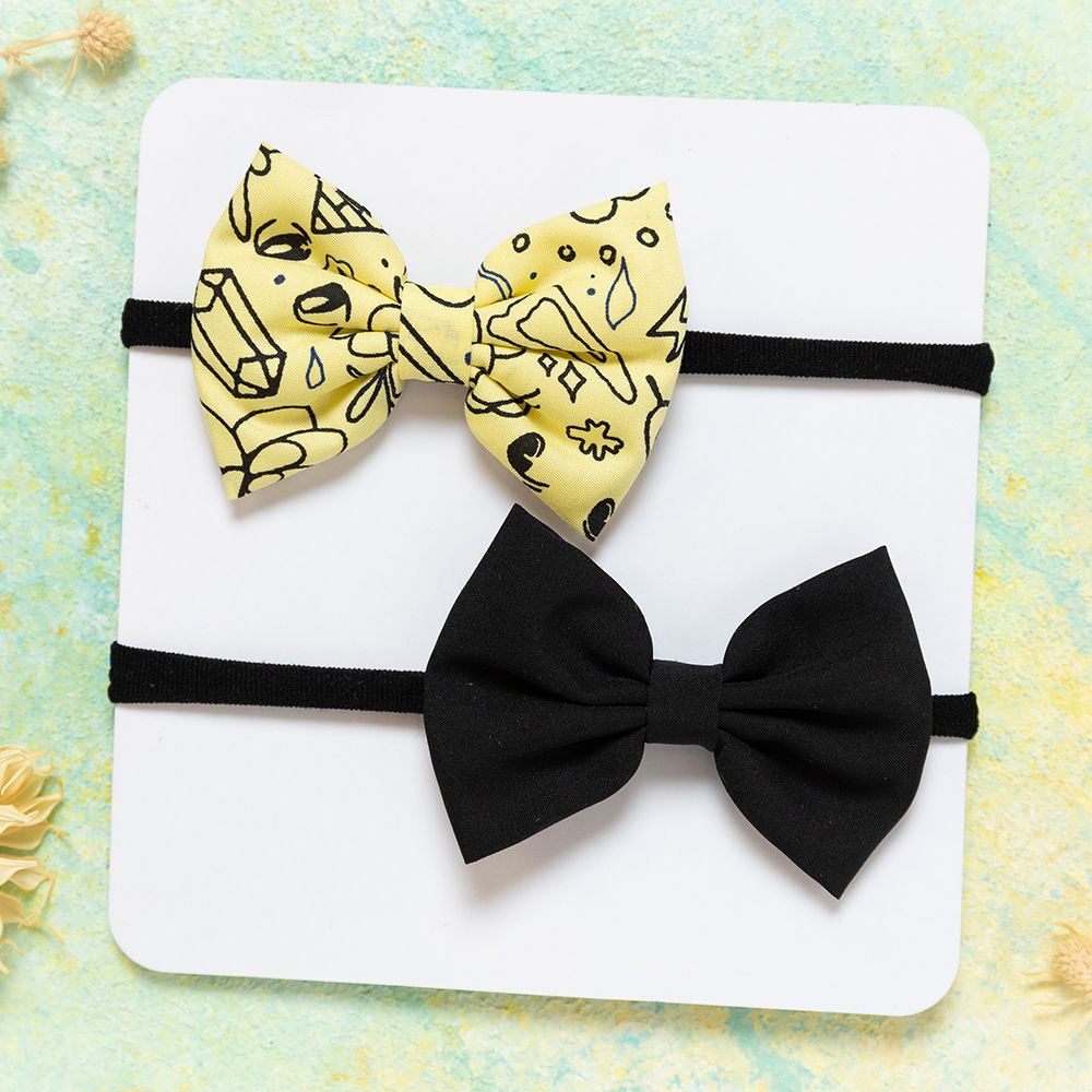 

each bow measures approximately 2 inches x 3” and is
