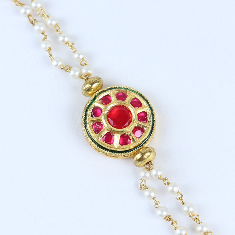 

this beaded kundan stone bracelet completes the ethnic look for