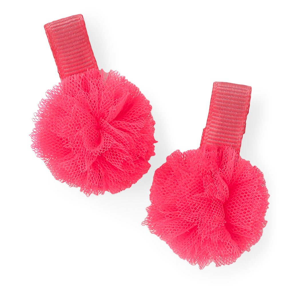 

sweet and simple handmade pom pom attached to an alligator
