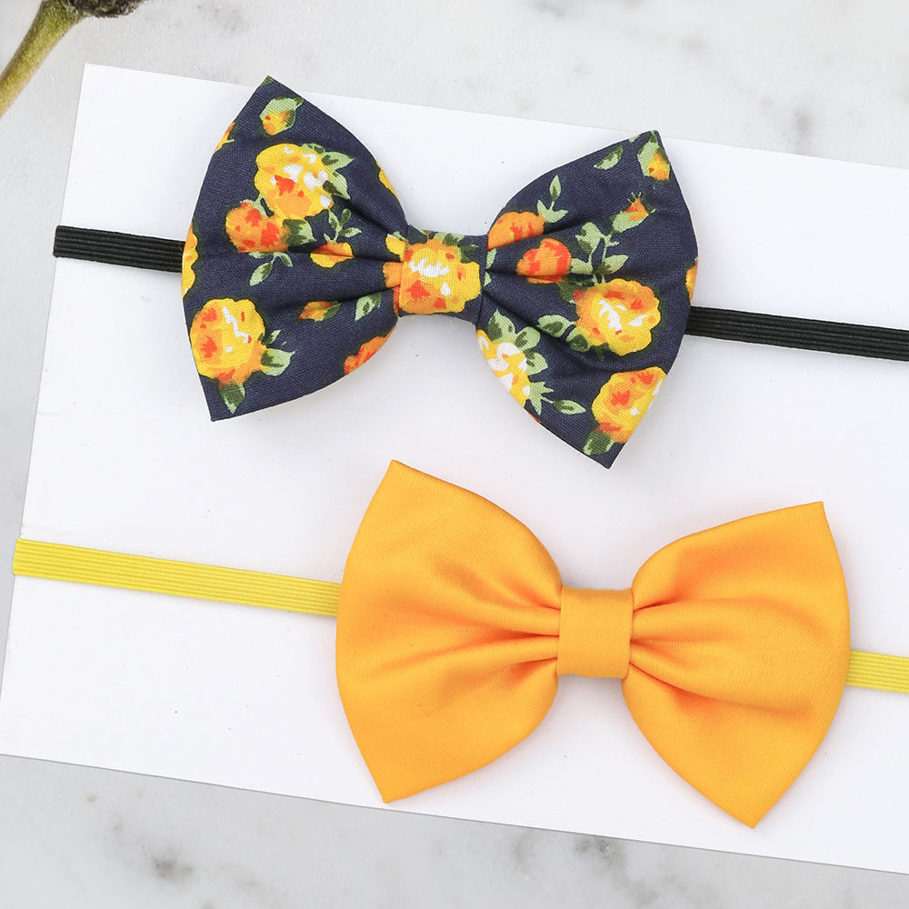 

each bow measures approximately 2 inches x 3” and is