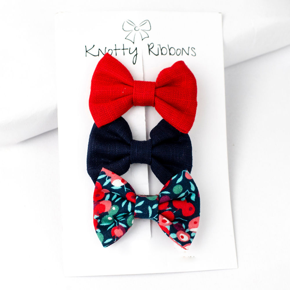 

sweet and simple handmade bows attached to an alligator clip