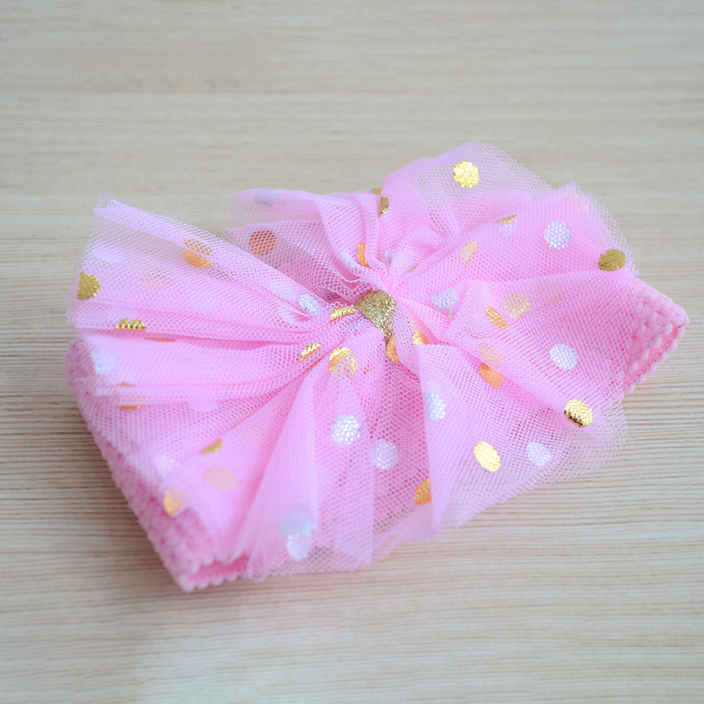 

soft cotton fabric plaited and attached to a broad hairband