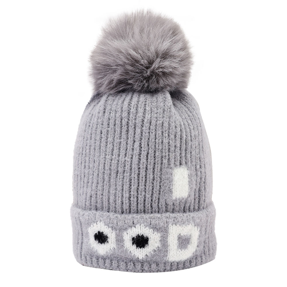 

dinosaur beanie lined with velvet fleece covering baby s face