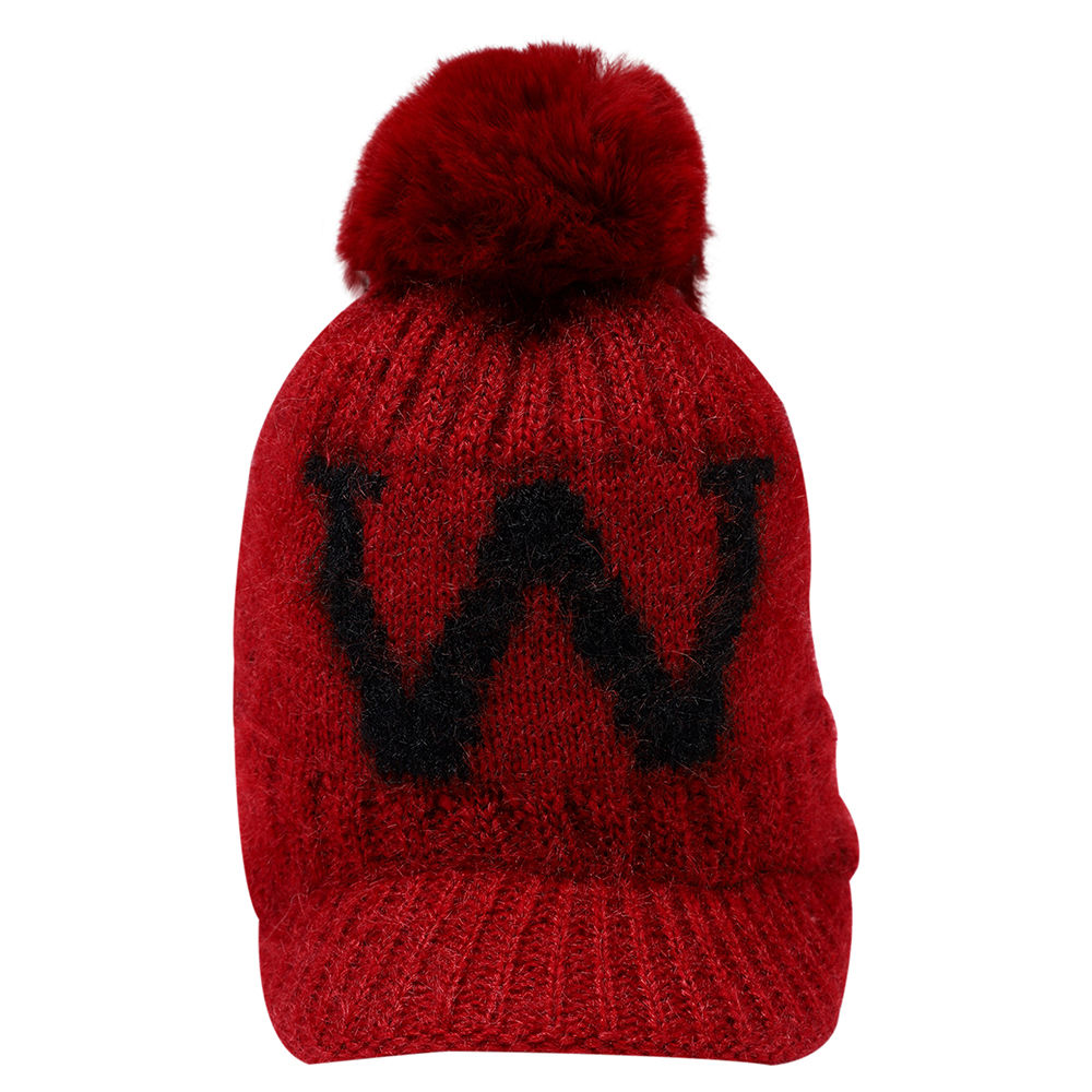 

dinosaur beanie lined with velvet fleece covering baby s face