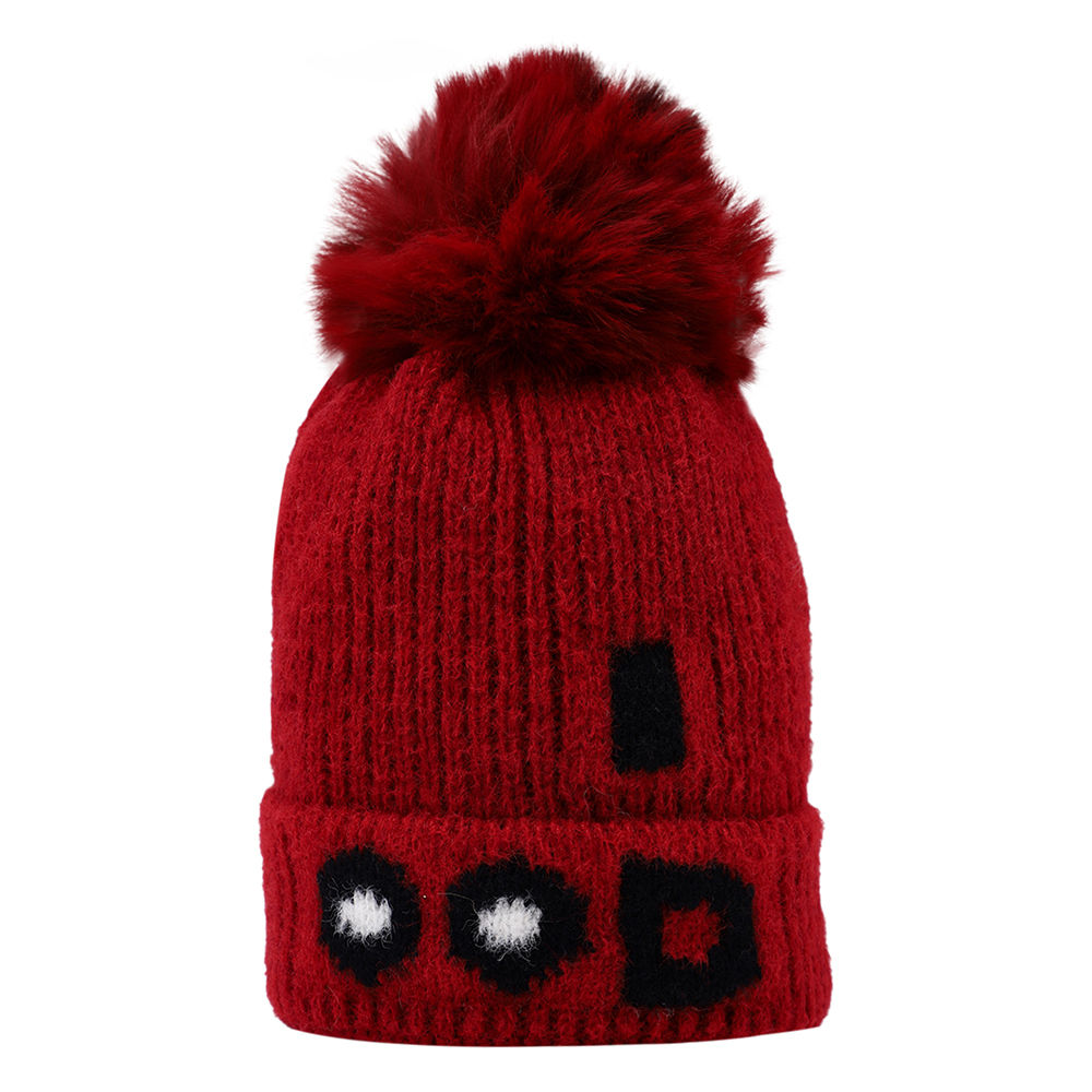 

dinosaur beanie lined with velvet fleece covering baby s face