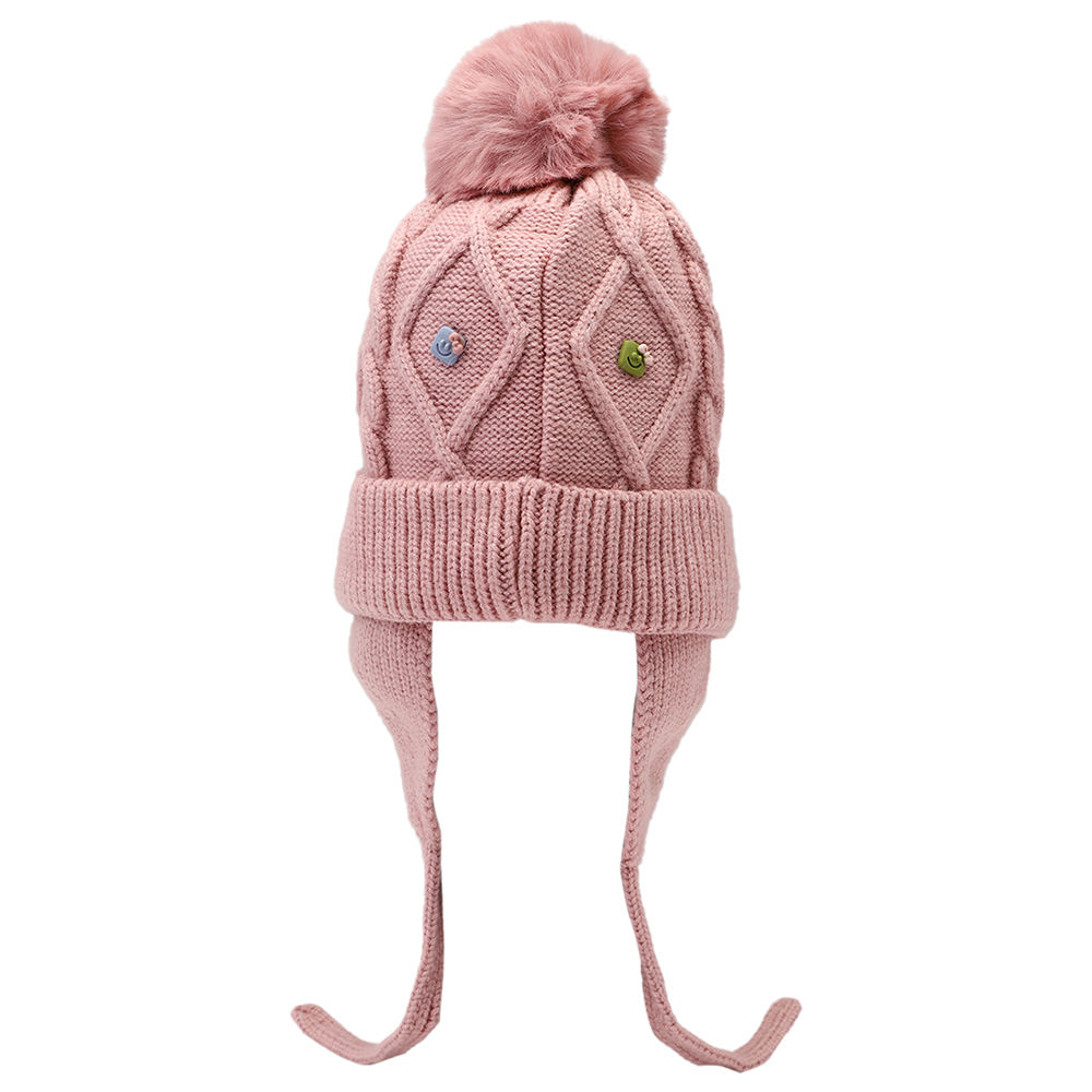 

dinosaur beanie lined with velvet fleece covering baby s face