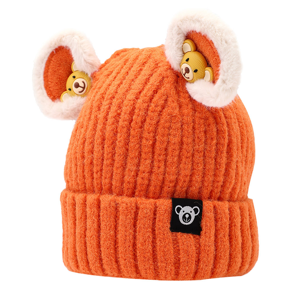 

dinosaur beanie lined with velvet fleece covering baby s face