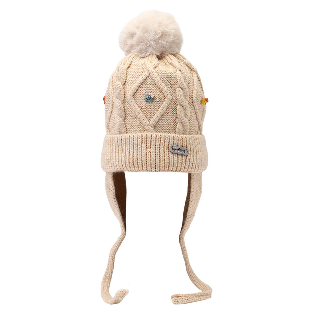 

dinosaur beanie lined with velvet fleece covering baby s face