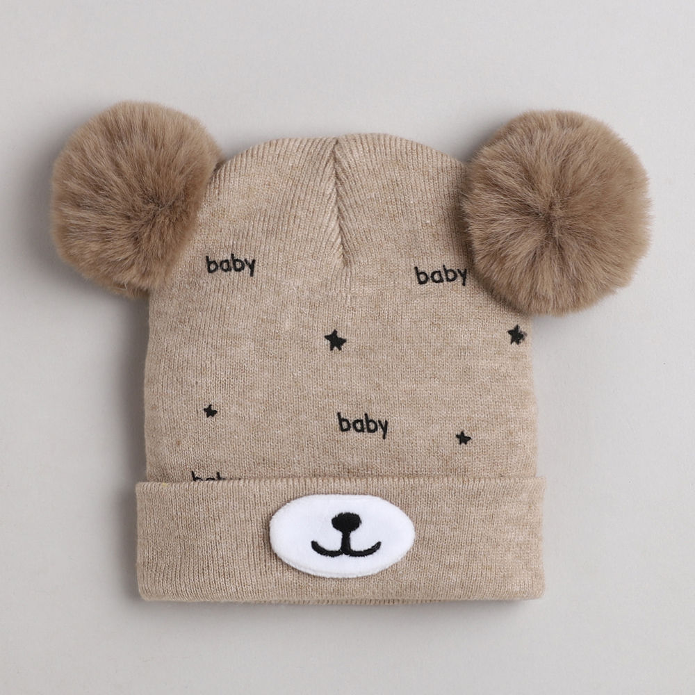 

dinosaur beanie lined with velvet fleece covering baby s face