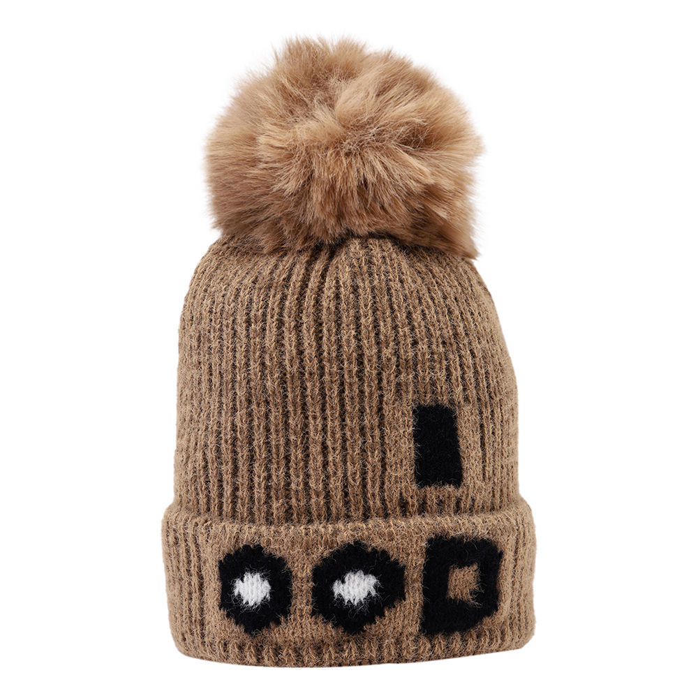 

dinosaur beanie lined with velvet fleece covering baby s face