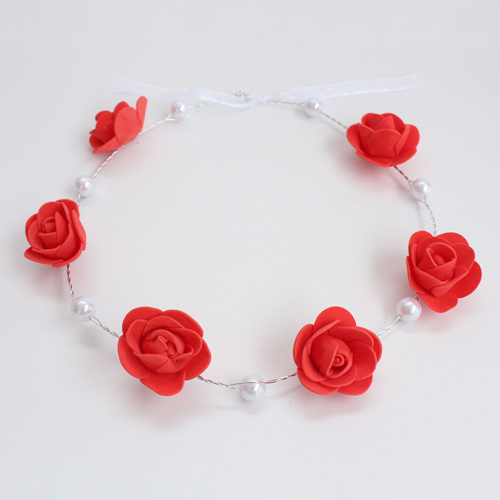 

a statement party wear tiara style headband embellished with faux